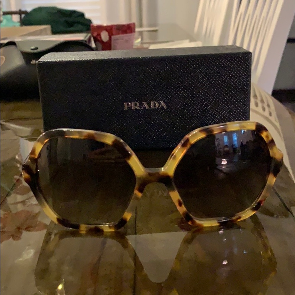 Prada sunglasses. Large tortoise print brown lens.